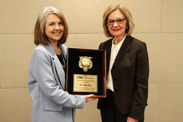 Associate Dean for Research and Graduate Education Tammy Dugas with Distinguished Alumna Alma Roy